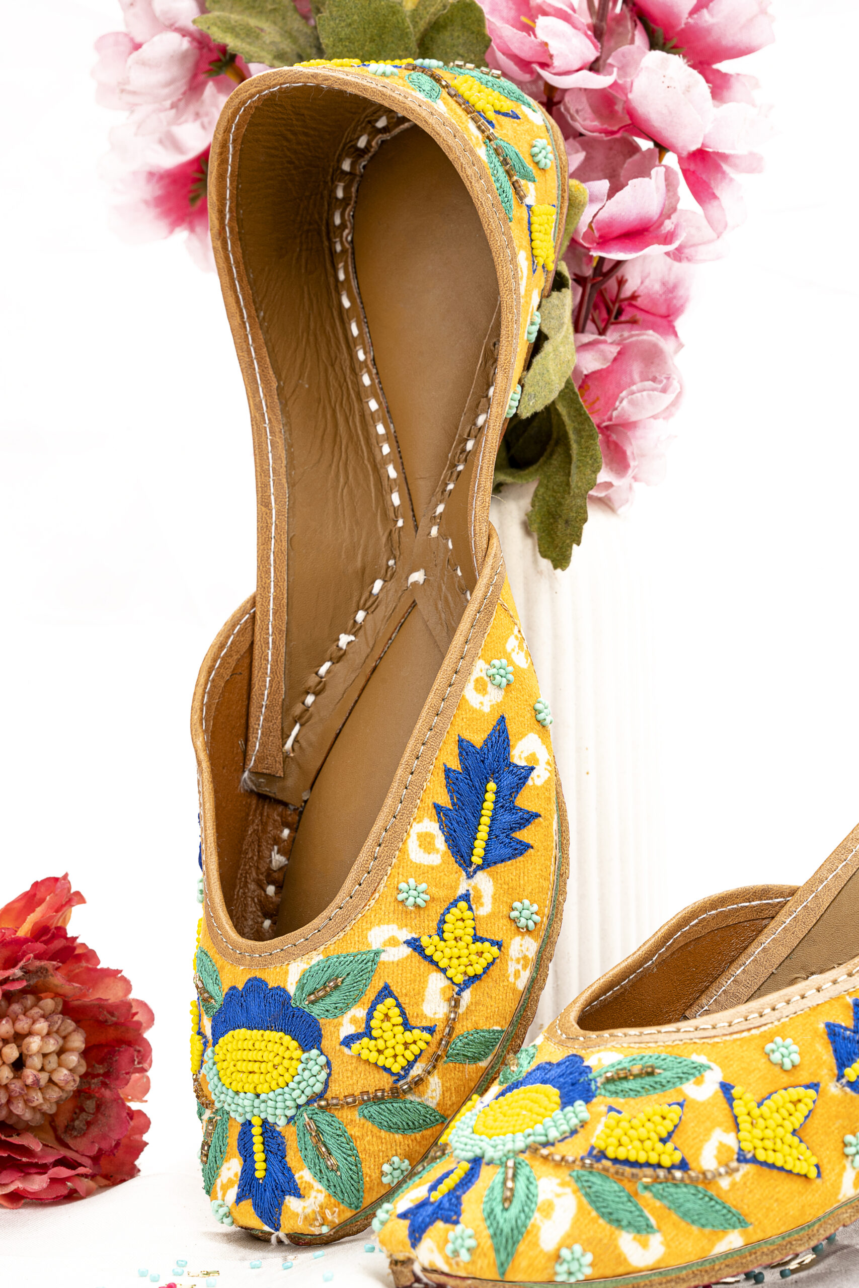 Sophistication and softness combined in silk-lined leather sole footwear.